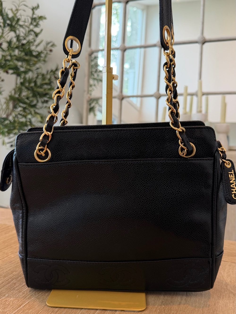 CHANEL Black Quilted Leather Shoulder Bag with Gold Chain Accents